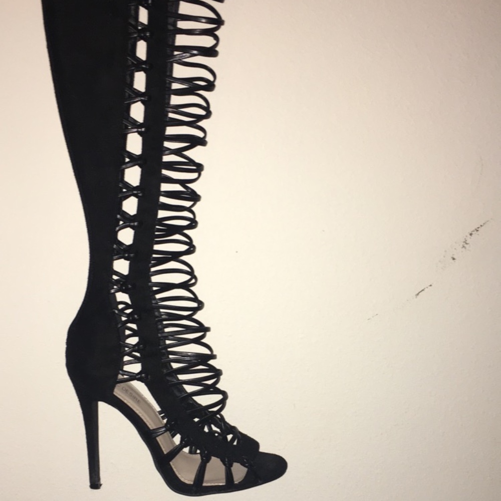 Zip up knee high heel boots